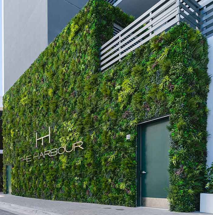 artificial plant walls on commercial building exteriors